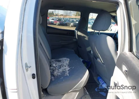 2009 Toyota Tacoma Base V6 z USA, uszkodzony, nr VIN 3TMMU52N89M010636